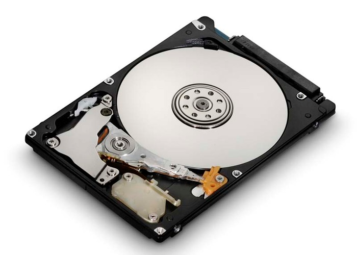 PARTICIONES Y FORMATOS 1. Función de un disco duro Un disco duro es un dispositivo que permite el almacenamiento y recuperación de grandes cantidades de información.