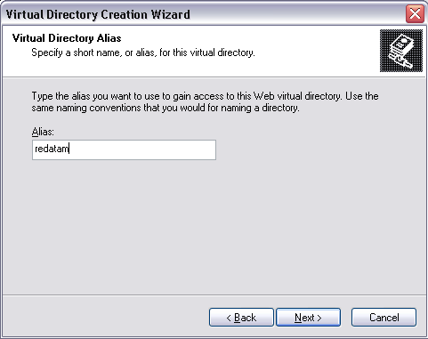 Predeterminado (Default Web Site), clic derecho y seleccionar Nuevo Directorio Virtual (New y luego Virtual Directory).