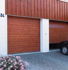 Puerta seccional para garaje tipo GSH EN MADERA MACIZA SI LO PREFIERE NATURAL sin tratar pino roble Muy apreciada La madera transmite calidez y subraya el carácter natural.