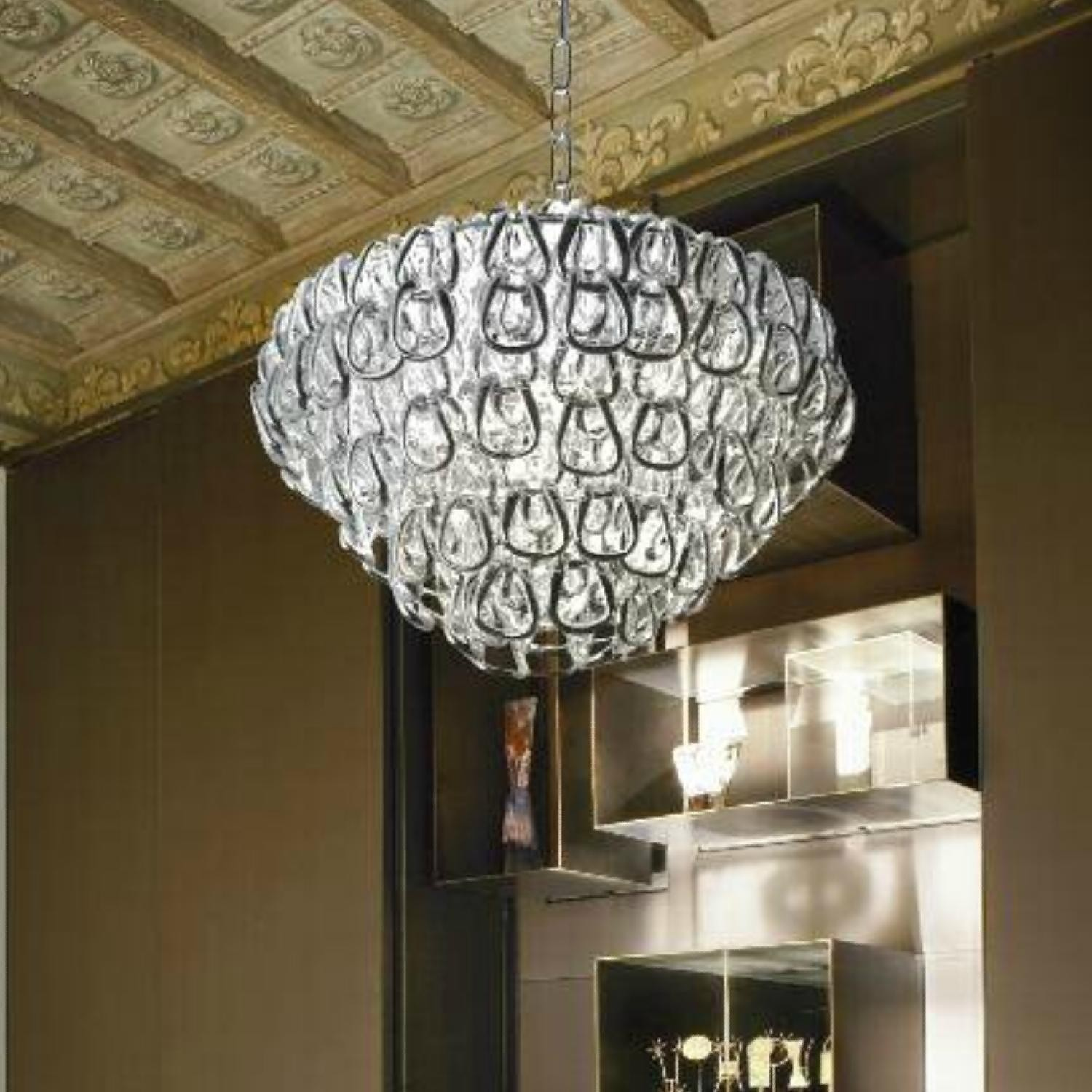 Minigiogali colgante Diseño: Angelo Mangiarotti 1967, diseño actualizado en 2009. Lámpara compuesta de elementos de cristal realizados totalmente a mano, combinadas con una estructura metálica.