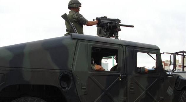 6 Abuso y miedo en Ciudad Juárez Un soldado mexicano patrullando en Ciudad Juárez.