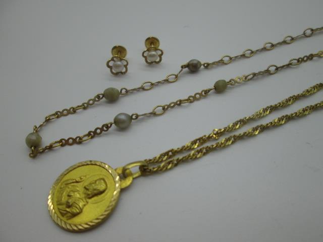 oro; dos cadenas y una  LOTE: L-014 Peso: 10,30 Precio: 180,00 Un