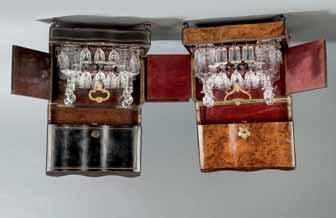 Salida: 220 868 Caja escribanía de palosanto y marquetería de ébano y latón, Francia, siglo XIX. Al interior madera de raíz de olivo y compartimentos. Medidas: 9 x 24 x 31 cm.