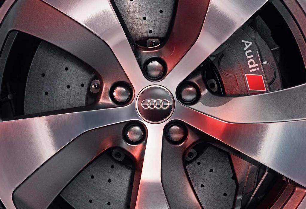 28 29 1 2 Destacar con los equipamientos del Audi. Como las llantas de aleación ligera de 21 pulgadas con diseño turbina de 5 brazos, gris contraste, parcialmente pulidas, opcionales¹, ².