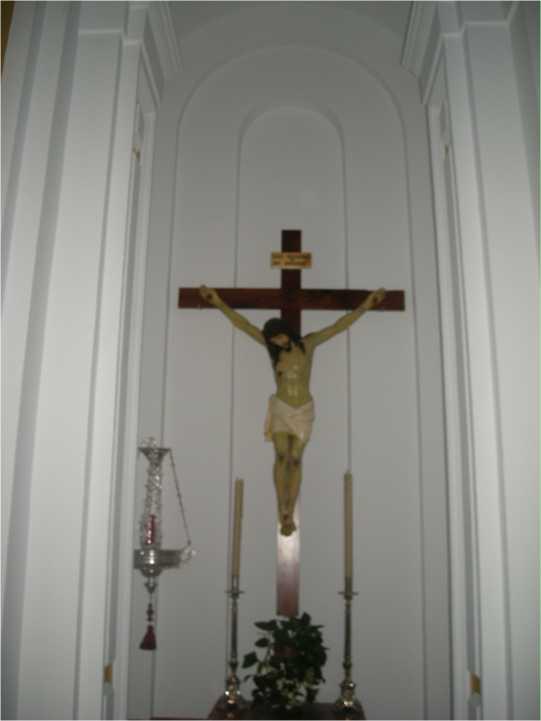 CAPILLA DEDICADA AL SANTO CRISTO DE LA MISERICORDIA Imagen de Cristo crucificado.