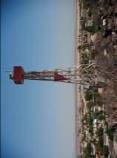 52" D.B. Período 3.0 21 7 8 Torre troncopiramidal metálica de 12.0 m. de altura pintada a franjas rojas verticales. Linterna direccional de185 mm.