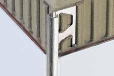 ÁNGULOS Y CANTONERAS Schlüter -RONDEC-A Schlüter -RONDEC-A es un perfil de aluminio anodizado para las esquinas de paredes con revestimientos de cerámica con un separador para lograr juntas