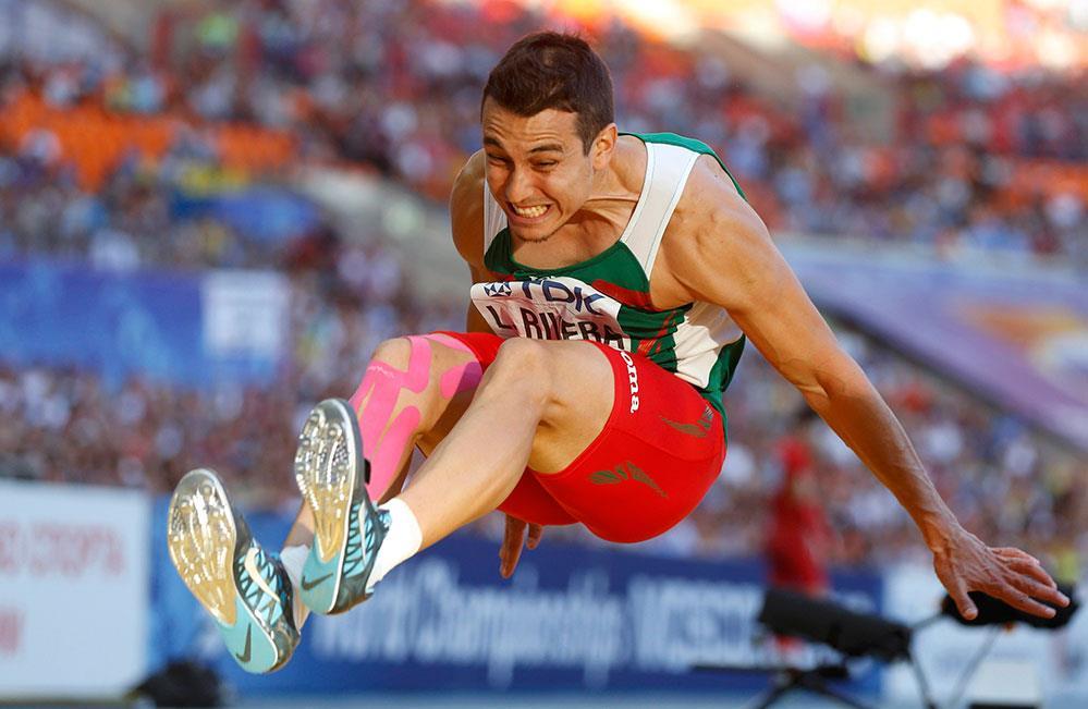Ejemplo para resolver: Salto de longitud (Serway, 2005) Un atleta que participa en salto de longitud deja el suelo a un ángulo de 20.0 sobre la horizontal y con una rapidez de 11.0 m/s.
