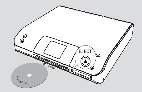 2. En el Centro, introduzca el CD de actualización en la ranura de carga del CD, con la cara impresa del CD hacia Vd.