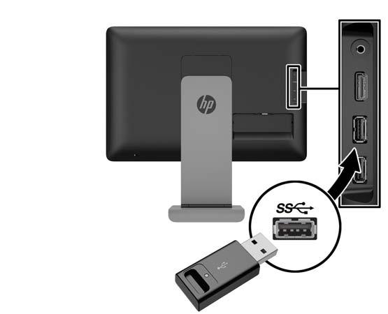 4. Conecte un extremo del cable de USB suministrado al conector USB en la parte trasera del equipo, y el otro extremo al conector USB del monitor.
