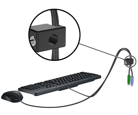 2. Pase los cables del teclado y del mouse a través del bloqueo. Figura C-4 Enroscado de los Cables del Teclado y del Mouse 3.