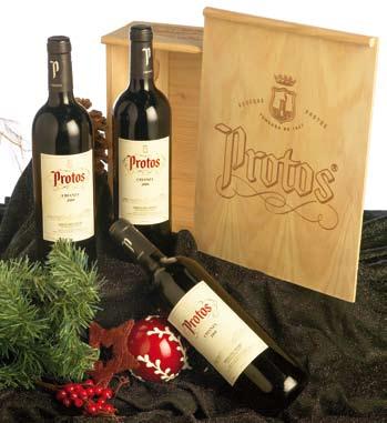 41 de fusta amb: 3 ampolles de vi negre Rioja