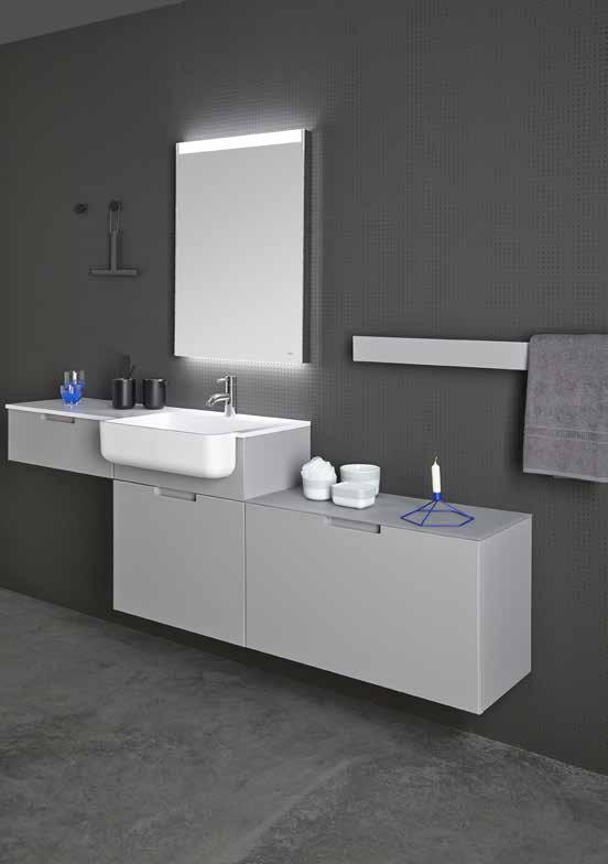 STRATO Composition of wall-mounted modules with drawer in Cuarzo 279 matt Glass. Mirror with LED lighting (ST339 3F). Wall mounted towel rack (ST052) in Cuarzo 279M matt Lacquer.