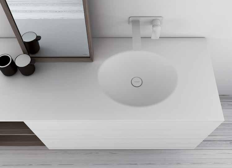 STRATO Top with integrated KA washbasin in matt Solidsurface. Wall mounted modules with drawer in Blanco 200B glossy Lacquer and opened with shelf in Nogal Natural Blanqueado 431.