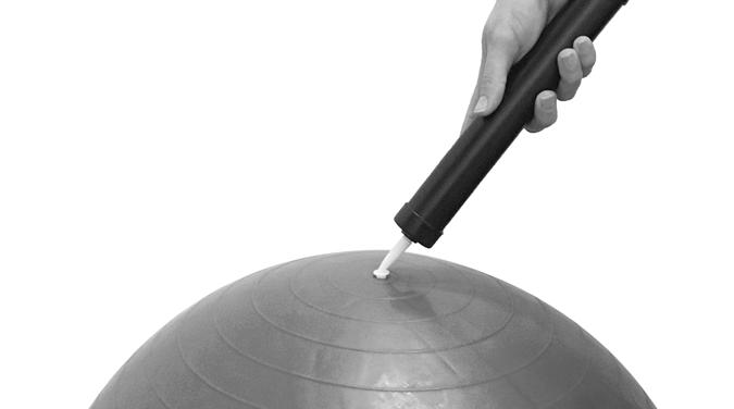 Step 4: When inflation is complete, quickly remove the air pump from the exercise ball and insert the long white plug, pushing until flush with the ball surface.
