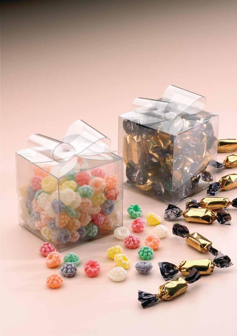 Ref. 530 Estuche lazo con caramelo personalizado Contiene 115 grs. de caramelo Medidas 10,5 x 10.5 x 10,5 cm. Ref.