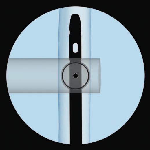 Incline el adaptador para que la punta de la broca quede centrada sobre el orificio de bloqueo. La broca deberá llenar casi completamente el círculo del agujero de bloqueo.
