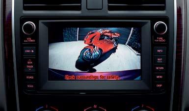 La entrada auxiliar para reproductor de MP3 viene estándar en todas las versiones de la Mazda CX-9.