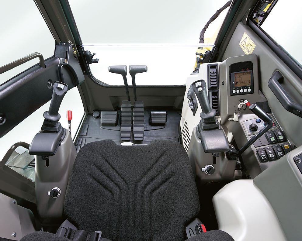NUMEROSAS FUNCIONALIDADES PARA FACILITAR EL CONTROL Puesto de conducción perfectamente ergonómico La disposición del interior de la cabina de la SV100-2 ha sido estudiada para mejorar el puesto de