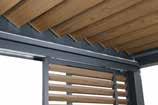 Las lamas de techo Wooddesign aportan un toque de madera natural a la pérgola, a la vez que ofrecen todas las ventajas del aluminio en cuanto a facilidad