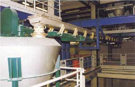 Sistema transportador de resonancia para el enfriamiento de un químico pulverizado