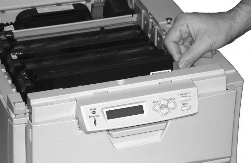 4. Lower the other end of the black toner cartridge into the image drum (1) and lock it in