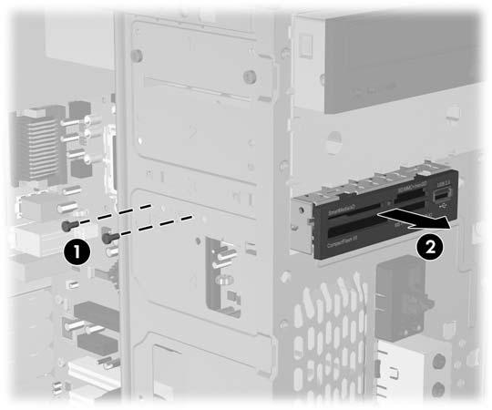Extracción de una unidad de 3,5 pulgadas para lector de tarjeta multimedia o disquete El compartimiento externo de 3,5 pulgadas puede estar ocupado por una unidad de disquete o de lector de tarjeta