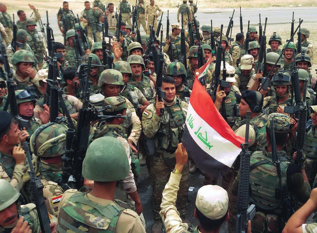Miembros de las Fuerzas Armadas iraquíes celebran una victoria contra el Daesh a mediados del pasado agosto.