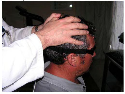 Es el mismo procedimiento que con el HIT excepto que en este el paciente utiliza un par de goggles livianos y ajustados a su cabeza los cuales tienen incorporados una pequeña videocámara y un espejo.