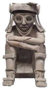 El Zapotal Escultura que representa a un personaje en posición sedente con los brazos cruzados y descansando sobre sus rodillas, porta brazaletes, rodilleras con forma triangular y sandalias donde es