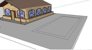 Para dibujar lo que va a ser el jardín con una piscina, empujamos hacia uno de los laterales la base de la casa, y dibujamos un rectángulo dentro de otro.