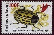 1999 Marzo 22 : Coleoptera de 1996 sobresellado con un dinosaurio y un