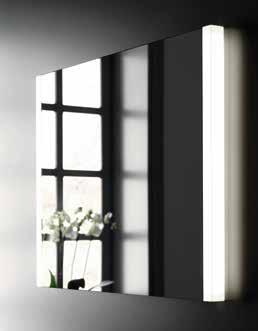 Elegancia discreta: Del mismo modo que los armarios con espejos, también están disponibles espejos con apliques adecuados para todos los tamaños de