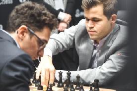 O site do Xadrez - 61/87 Empate épico en el décimo asalto LEONTXO GARCÍA Londres 23 NOV 2018 Caruana y Carlsen arriesgan mucho por fin; el marcador queda igualado (5-5) a falta de dos partidas El
