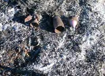using remotelycontrolled equipment, thus minimizing the chance of accidental contact by workers Without burning, the submunition is hidden under vegetation.