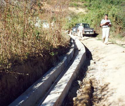 Santa Ana (Municipio de Vallegrande) Tanque de almacenamiento Mejoramiento de la obra de toma, revestimiento de 1500 m de canal con hormigón ciclópeo,