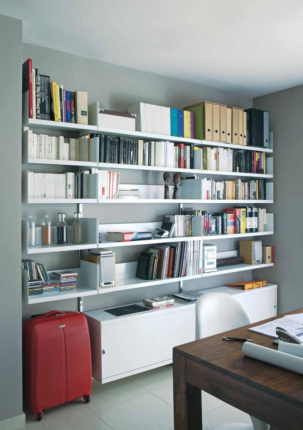 The T-99 system versatility and purity of design make this product a flexible solution for any space that requires a shelving system to store books, binder and any type of object.