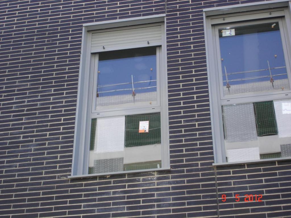 Detalle ventanas en fachada pral.