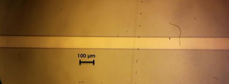 Figura 132. Microcanal observado con microscopio metalográfico diferente área.