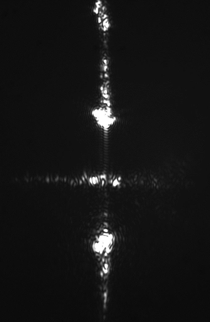 Figura 29. Transmisión de fotones provenientes de la muestra hacia la sonda.