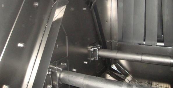 interior - Vestíbulos de contención de granalla con múltiples cortinas de goma Transportador de rodillos paralelos - Sistema de rodillos paralelos en largos conforme requerimiento - Velocidad