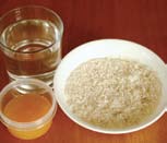 45 g de proteínas primer plato 1 taza de arroz enjuagado 1 1/4 de taza de agua El jugo de 1/2 de naranja Sal
