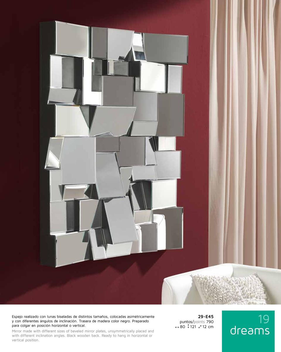 Mirror made with different sizes of beveled mirror plates, unsymmetrically placed and with different inclination