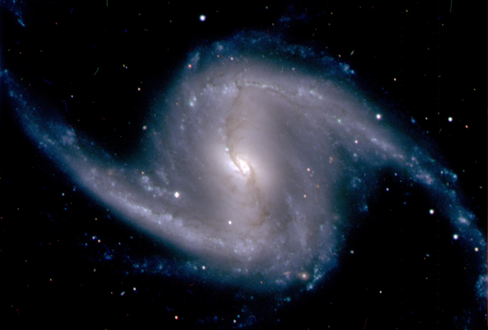 Barred spiral galaxy NGC 1365, in the Fornax cluster of galaxies, which lies