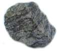 otras rocas sometidas a altas presiones y temperaturas, sin llegar a fundir Basalto