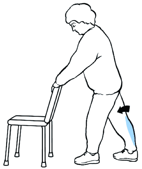 Estiramiento de pantorrilla (pantorrilla) Coloque las manos en el respaldo de una silla para mantener el equilibrio y párese erguido.
