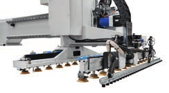 Soluciones de carga y descarga Celda automatizada para elaborar un lote de paneles o puertas. Synchro es un dispositivo de manipulación de 4 ejes controlados que equipa el centro de trabajo Rover.