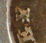 7 ar en la foto de la derecha, en la parte izquierda de la orla un punto entre UNION y Y ; moneda huésped de plata, KM 92, Chile, 1834.