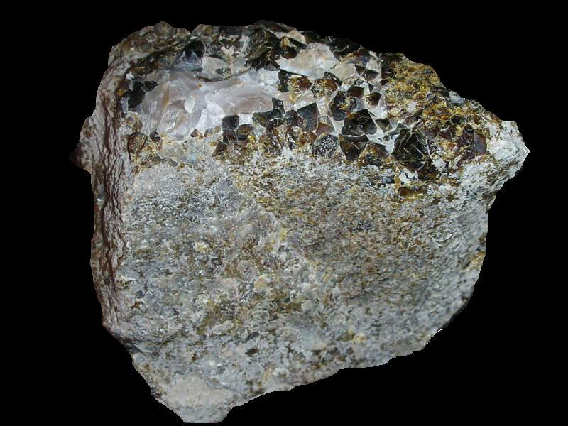 Skarn El término skarn fue introducido por petrólogos metamórficos suecos para designar rocas metamórficas regionales o de contacto constituidas por silicatos de Ca, Mg y Fe derivados de un protolito