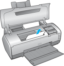Abra la cubierta de la impresora y extraiga el papel obstruido con cuidado. Precaución: No tire del papel con fuerza.